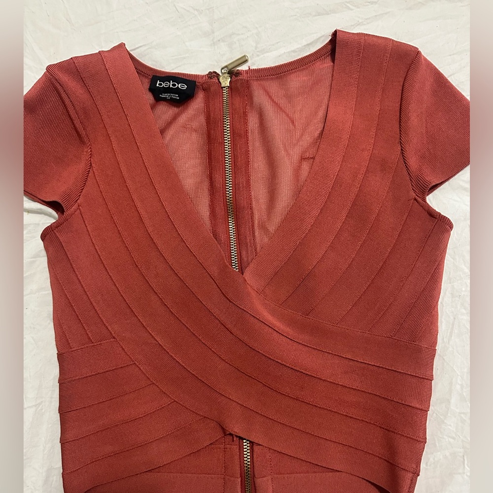 Beautiful bandeau top Bebe size small.